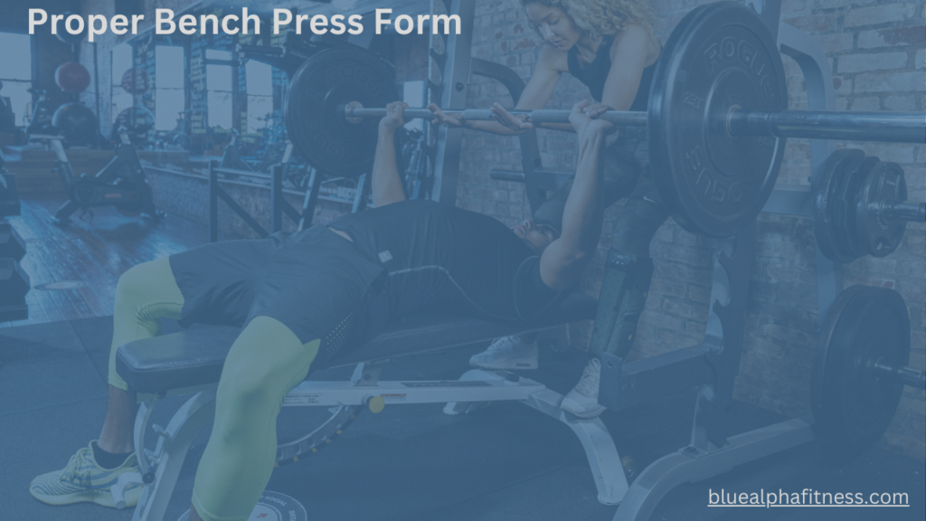 Person performing a bench press with proper form, assisted by a spotter for safety.