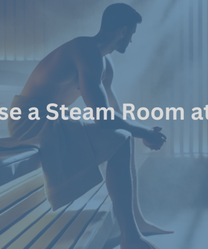 Fitness enthusiast sitting barefoot in a steam room at the gym, wrapped in a towel, relaxing and enjoying the therapeutic steam.